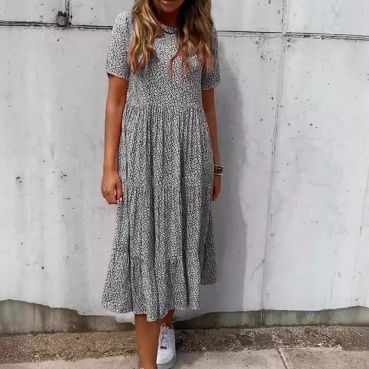 Women's light midi dress with gathered waist, short sleeves, and multilayered tiered skirt StylebySassy