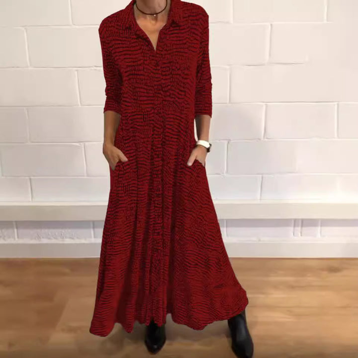 Ladies' flowing maxi dress with shirt collar, half-length sleeves, and side pockets StylebySassy
