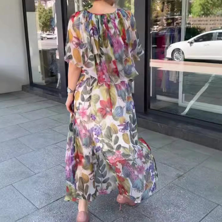 Women’s airy chiffon maxi dress with floral print, gathered round neckline and elastic waistband StylebySassy