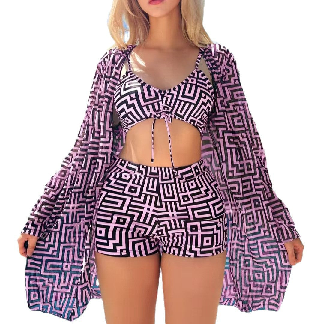 Women's stylish bikini set with geometric patterns and transparent beach jacket StylebySassy