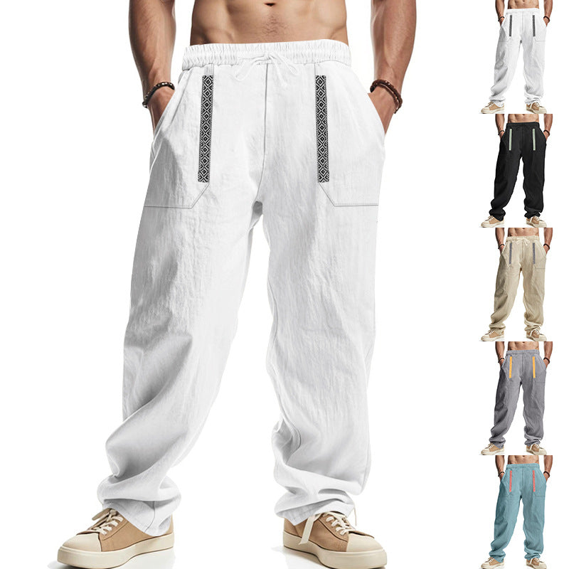 Men's loose-fitting casual pants made of linen blend with elastic waistband, deep side pockets, and ethnic decorative band StylebySassy