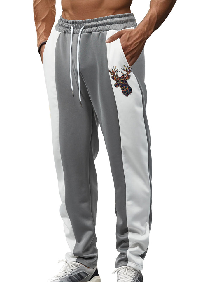 Men's sporty track pants with side contrast stripes, elastic waistband, drawstring, and deer embroidery StylebySassy