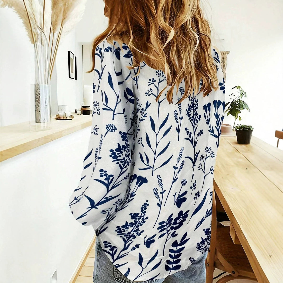 Women's loose linen-look blouse with V-neck botanical allover print and three-quarter sleeves StylebySassy