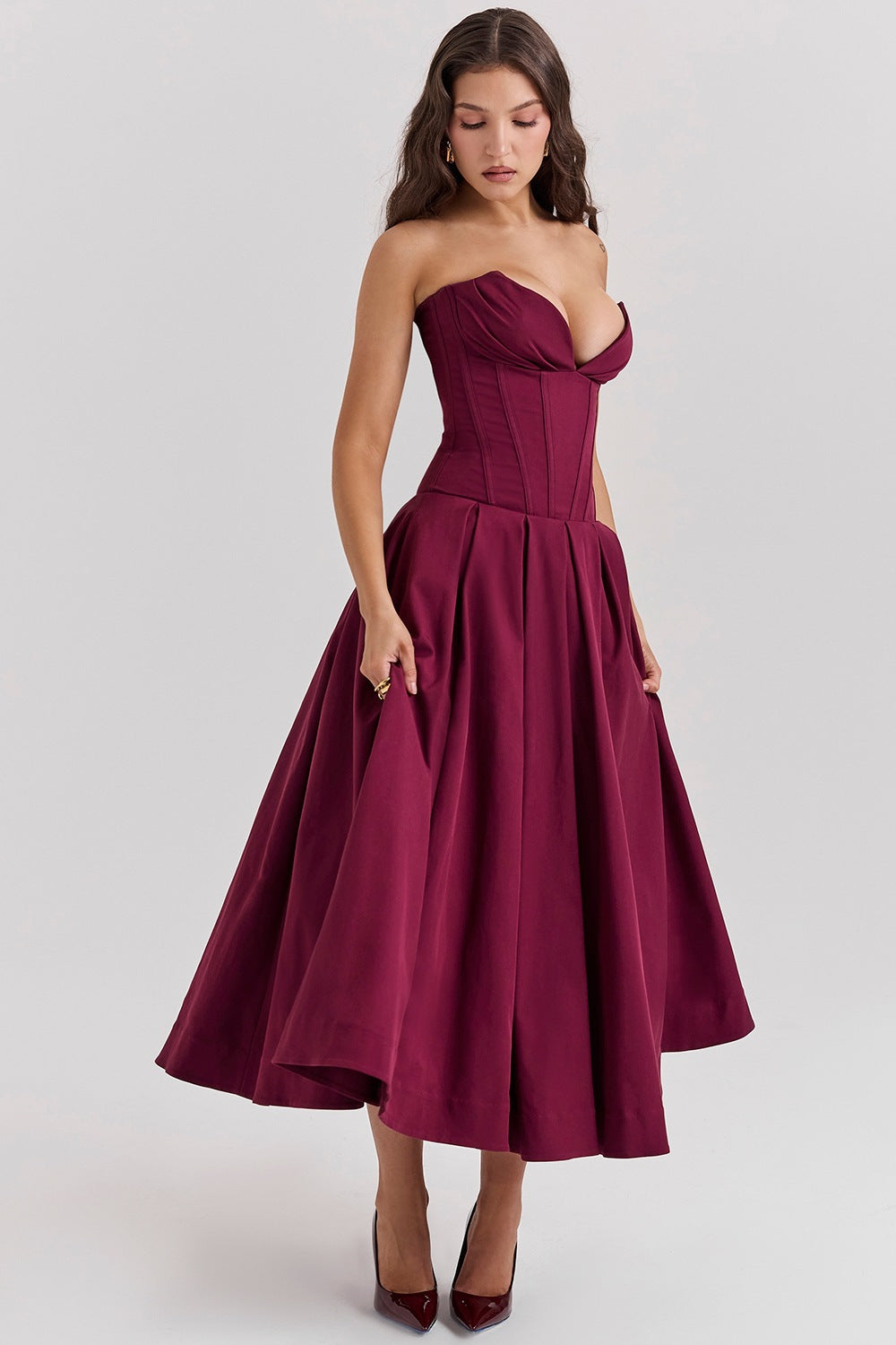 Women's strapless corset midi dress with pre-shaped bodice construction and flared circle skirt StylebySassy
