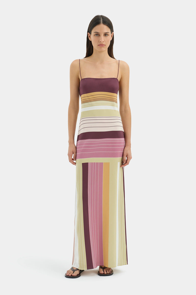 Women's figure-hugging maxi dress with spaghetti straps, straight neckline, panel stripes, and side slit StylebySassy