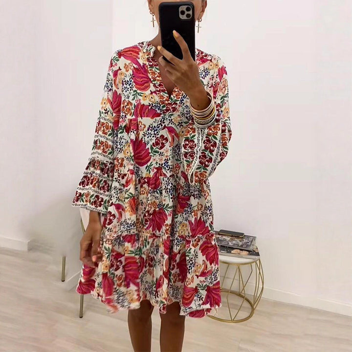 Ladies' floral ruffle mini dress in Boho style with V-neck and tiered silhouette StylebySassy