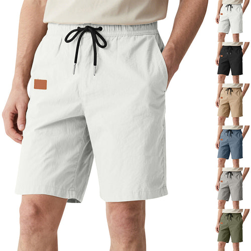 Men's quick-drying swim shorts in Bermuda cut with elastic waistband and drawstring StylebySassy