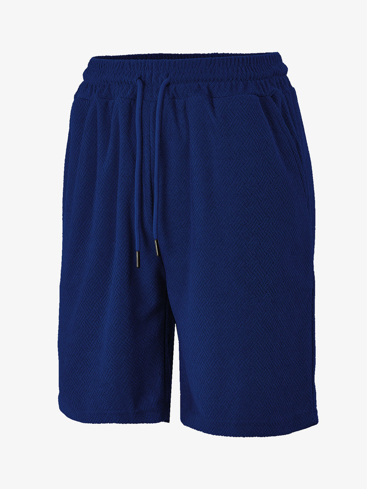 Men's terry shorts with herringbone texture, elastic drawstring waistband, and side pockets StylebySassy