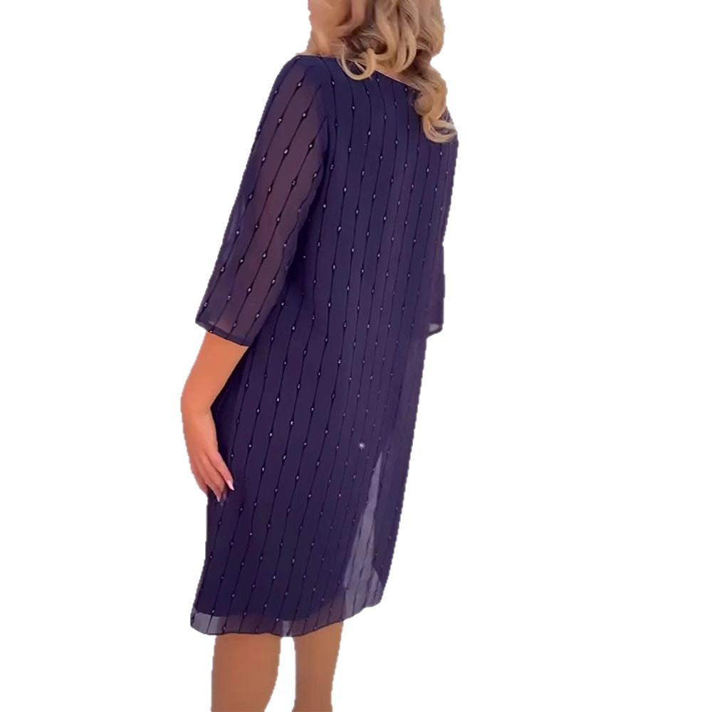 Ladies elegant chiffon midi dress with vertical sequin and bead appliqué as well as transparent three-quarter sleeves StylebySassy