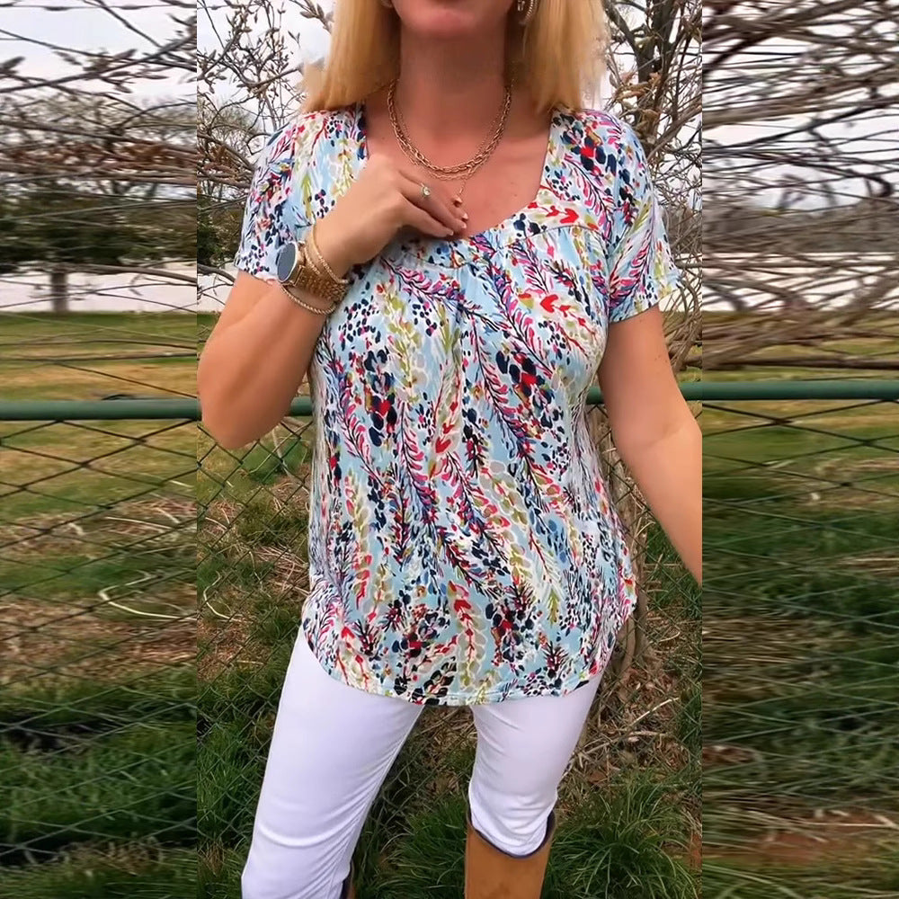 Women's lightweight floral round neck printed shirt with bust pleats and casual hip length StylebySassy