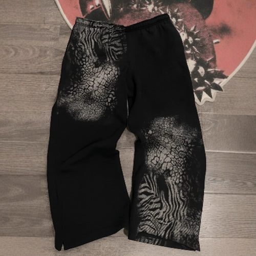 Women nan loose sweatpants with asymmetrical animal print, elastic comfort waistband and straight leg StylebySassy