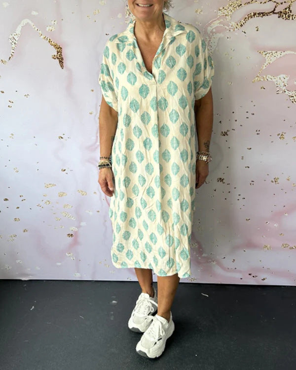 Women's shirt dress similar to a kaftan with V-neck, dropped shoulders, and textured muslin quality StylebySassy