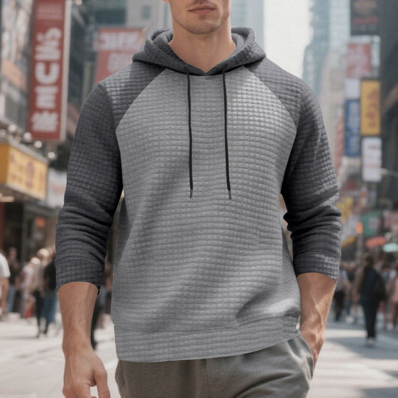 Men's quilted hoodie with raglan sleeves and drawstring StylebySassy