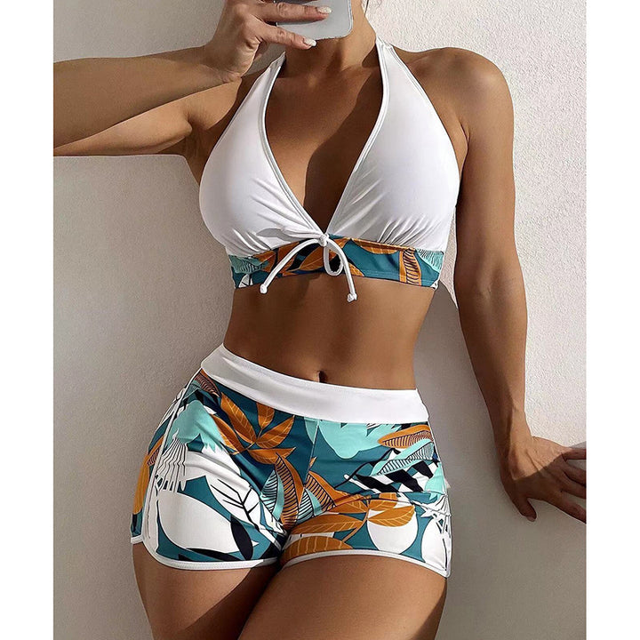 Women's bikini set with sporty high-waist cut and playful floral pattern StylebySassy