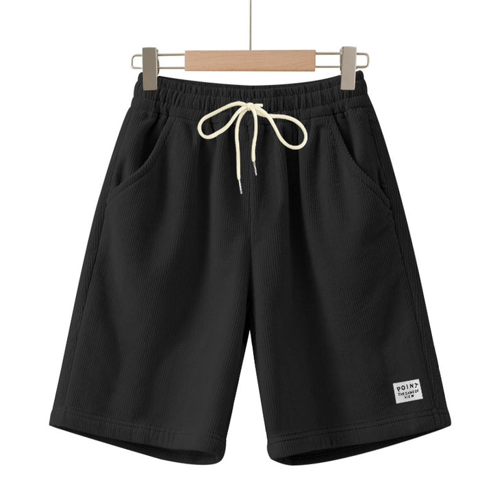 Men's knee-length lounge shorts in ribbed structure jersey with elastic drawstring waistband and patch pockets StylebySassy