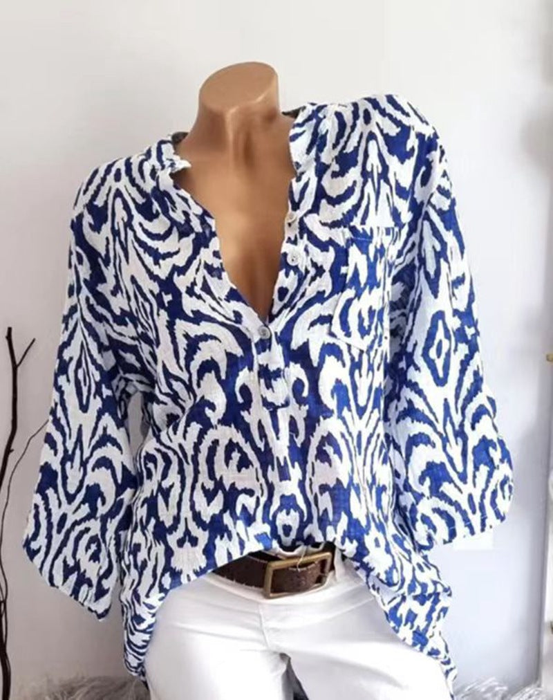 Women nan locker cut tunic blouse with Ikat pattern, V-neck and three-quarter sleeves StylebySassy