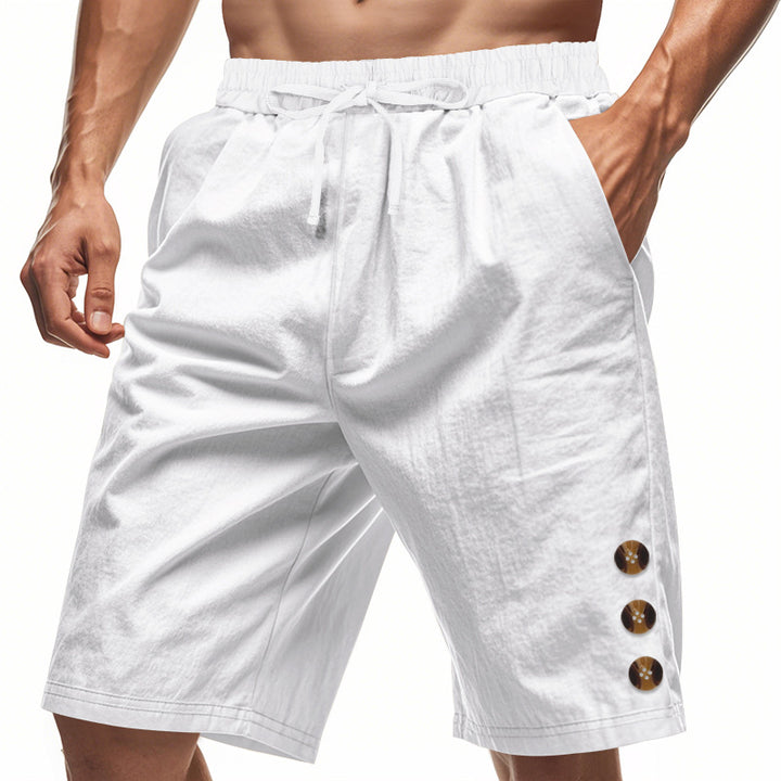 Men's knee-length casual Bermuda shorts with elastic tunnel drawstring waist, side slit pockets, and round decorative appliqués StylebySassy