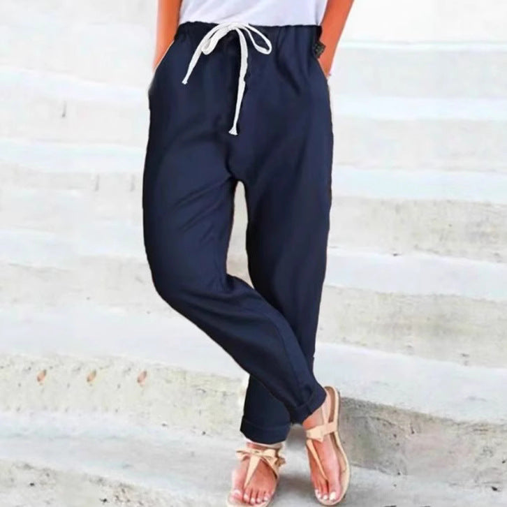 Women's casual relaxed pants with elastic waistband, drawstring, side pockets, and rolled hem StylebySassy