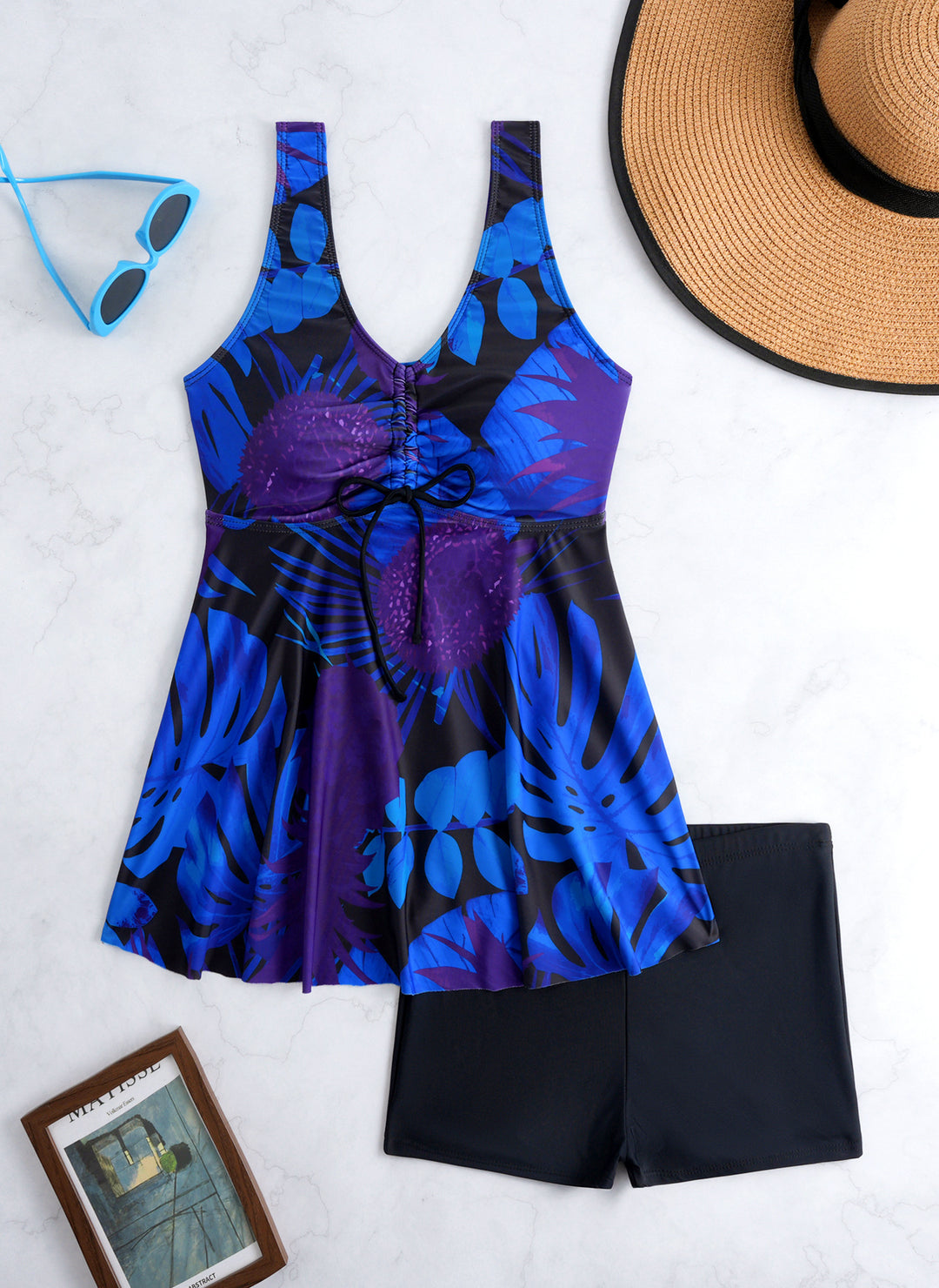 Ladies' tankini set with stylish ruffle and graphic peacock pattern StylebySassy