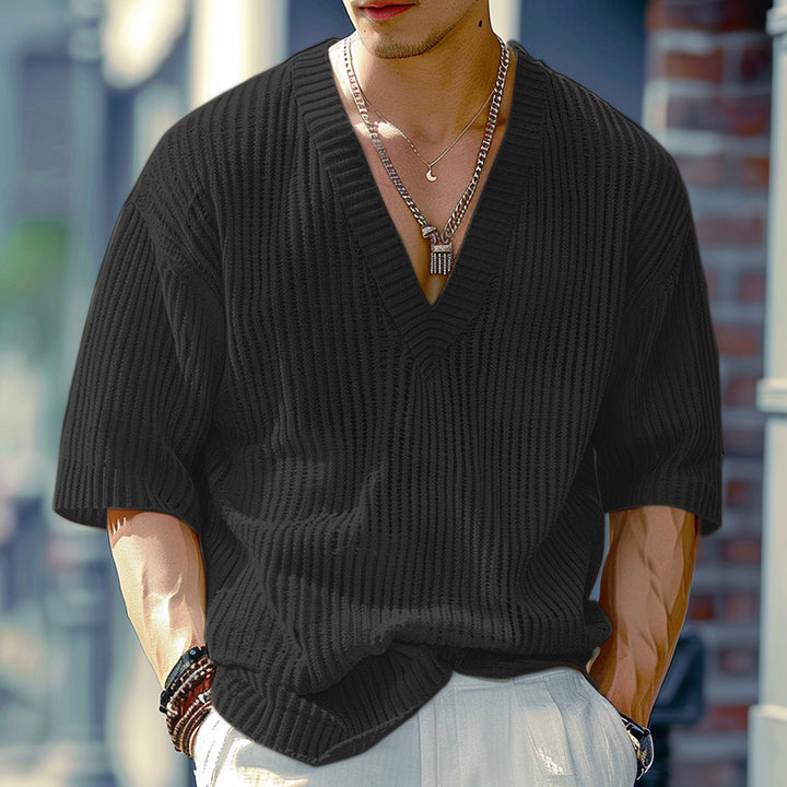 Women's oversized V-neck knit top with textured ribbed look and half-length sleeves StylebySassy