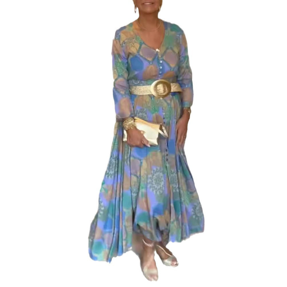 Women’s patterned maxi dress with full button placket, V-neck, long sleeves, and pleated skirt StylebySassy