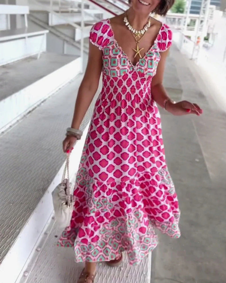 Women’s summer tiered dress with smocked top, V-neckline and puff sleeves StylebySassy