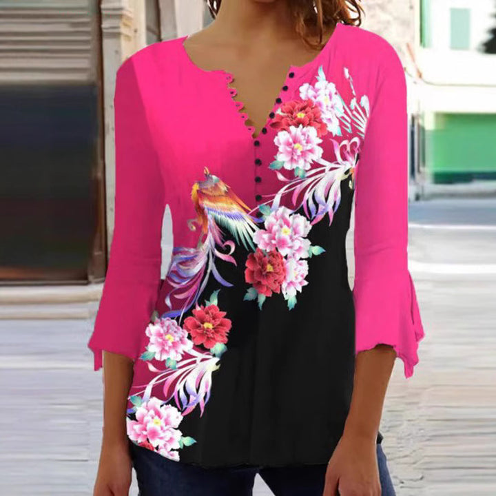 Women's V-neck tunic blouse with floral bird pattern, three-quarter flounce sleeves and figure-flattering hem StylebySassy