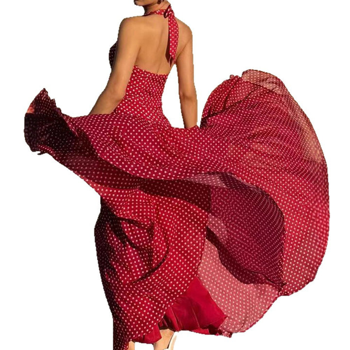 Ladies long halter dress with deep V-neck, tailored empire seam and flared layered skirt StylebySassy