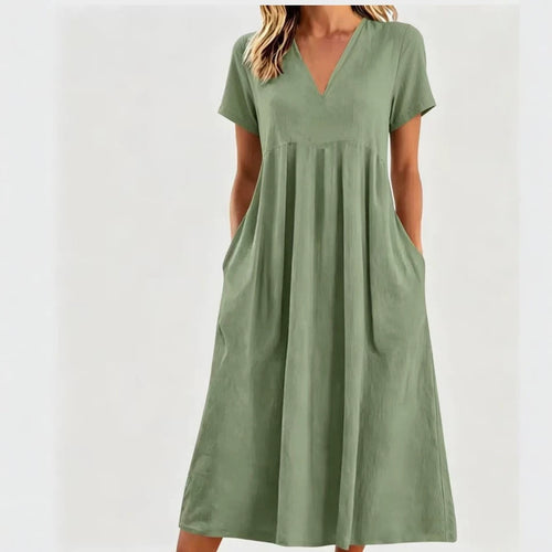 Women nan legeres V-neck midi dress with side pockets and gathered empire seam StylebySassy