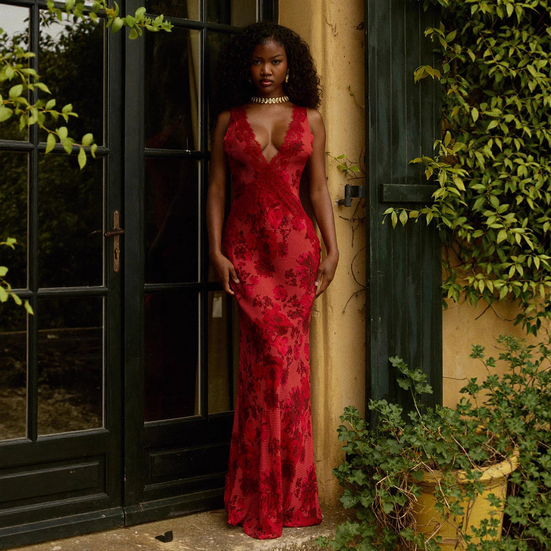 Women's form-fitting evening dress in mermaid cut with deep V-neck and floral lace trim StylebySassy