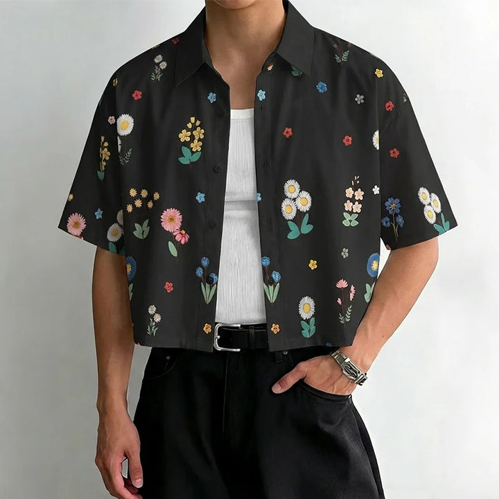 Women's loosely cut short sleeve shirt blouse with floral all-over print, shirt collar and short hem StylebySassy