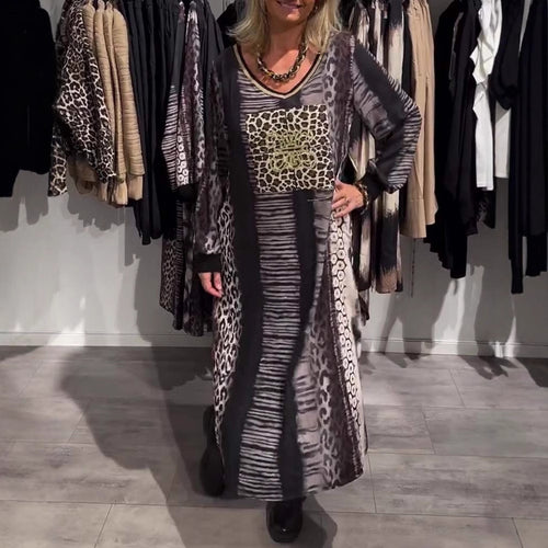 Ladies flowing panel long dress with patchwork animal print and gold-colored chest application StylebySassy
