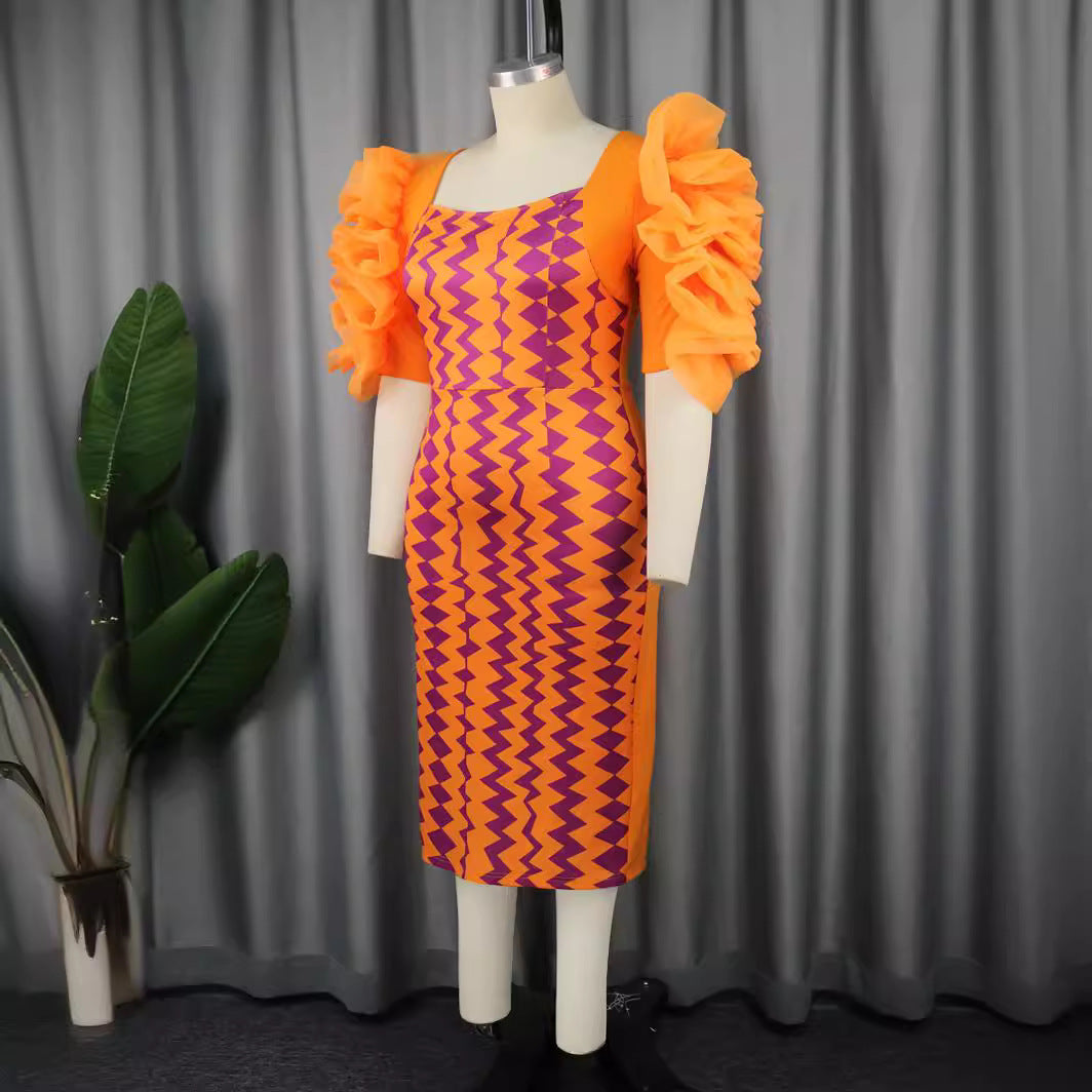 Women's fitted dress with striking ruffle sleeves and geometric pattern StylebySassy