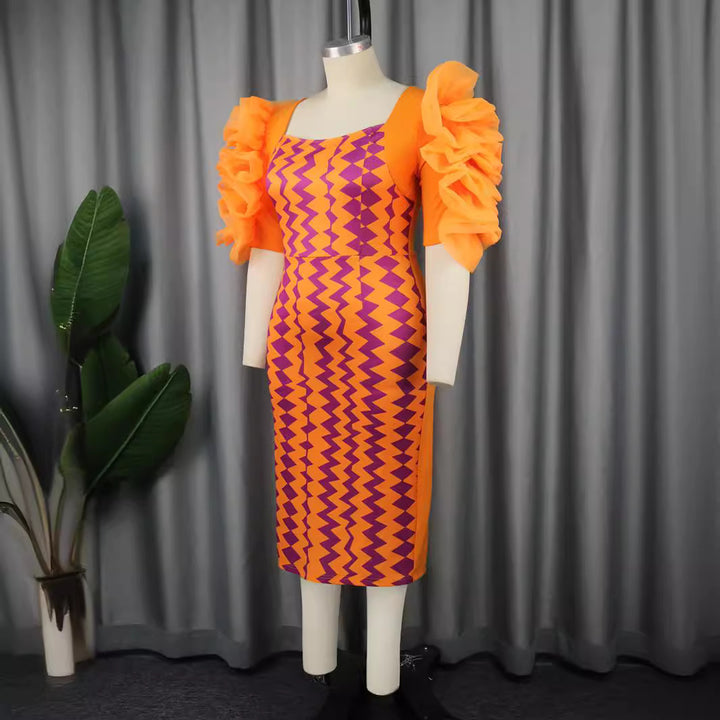 Women's fitted dress with striking ruffle sleeves and geometric pattern StylebySassy