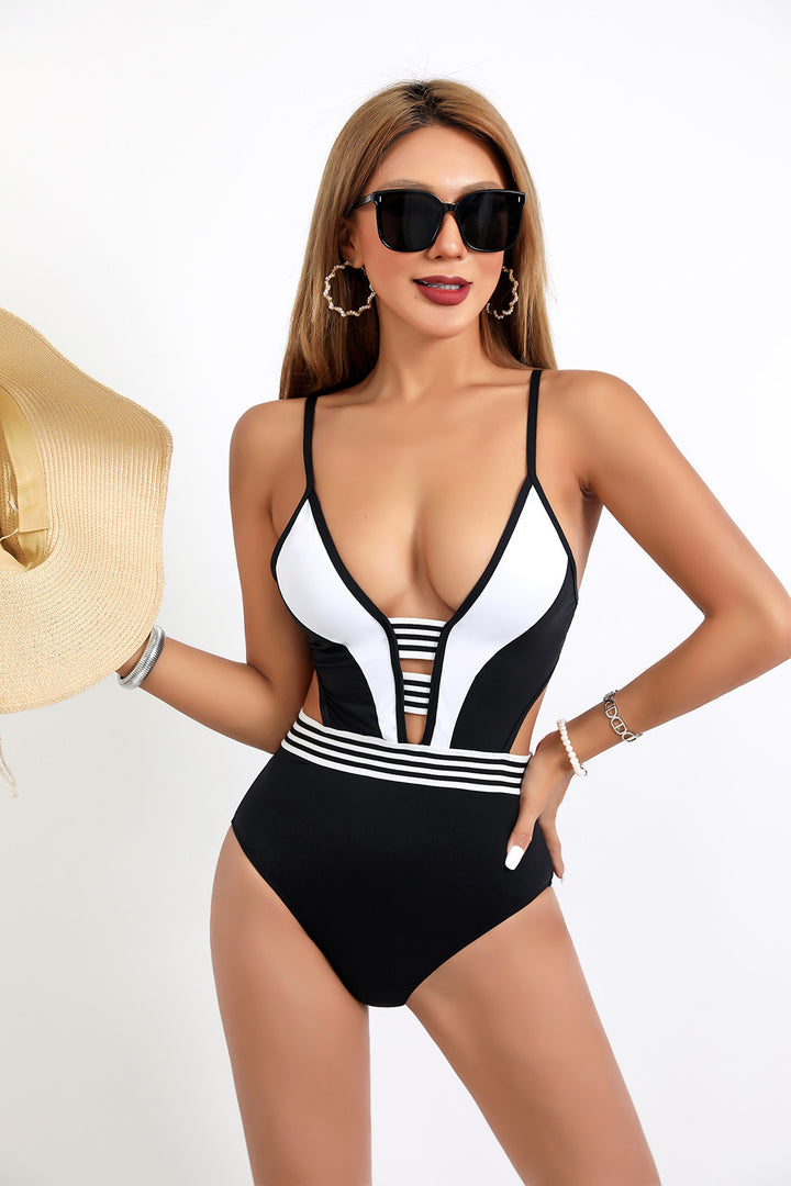 Women's Sporty One-Piece Swimsuit with Deep V-Neck and Side Cut-Outs StylebySassy