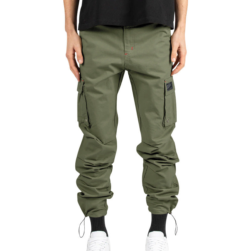 Men's multi-pocket casual trousers made of cotton twill with tapered leg and adjustable ankle drawstring StylebySassy