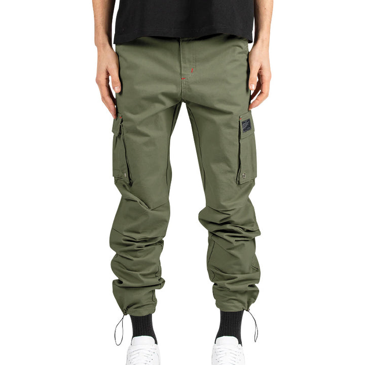 Men's multi-pocket casual trousers made of cotton twill with tapered leg and adjustable ankle drawstring StylebySassy