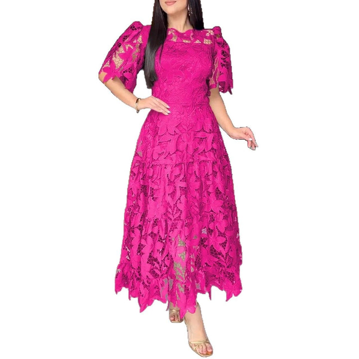 Women's maxi dress made of floral guipure lace with a fitted silhouette and tiered hem StylebySassy