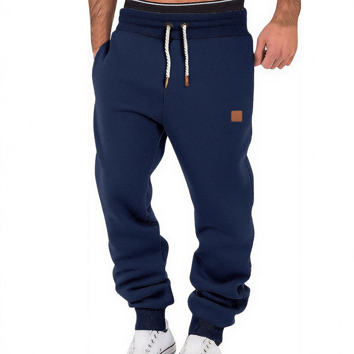 Men's comfortable jogging pants made of high-quality cotton blend with elastic waistband, drawstring, and cuffs StylebySassy