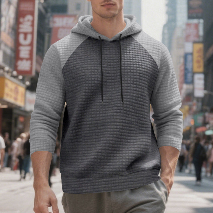 Men's quilted hoodie with raglan sleeves and drawstring StylebySassy