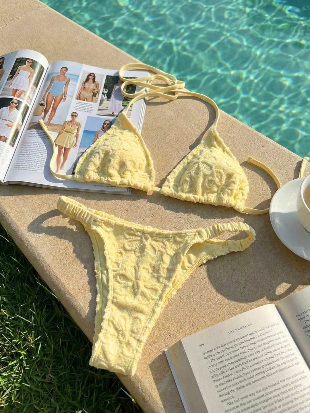 Women's triangle bikini with flower-shaped embroidery StylebySassy