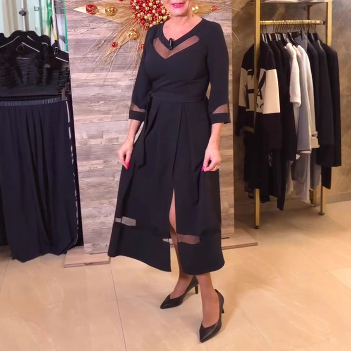 Women's fitted midi dress with transparent mesh inserts, tie belt and feminine A-line StylebySassy