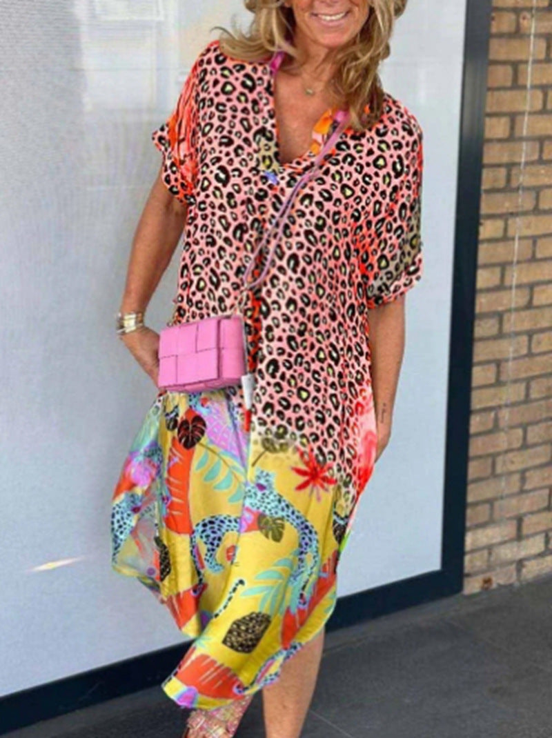 Women's loosely fitted V-neck midi dress with leopard and tropical print StylebySassy