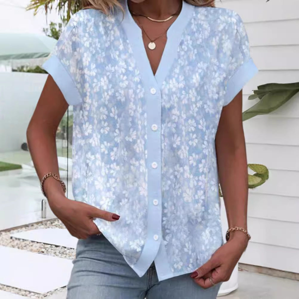 Women's airy button blouse with V-neck, rolled sleeves and floral textured print StylebySassy