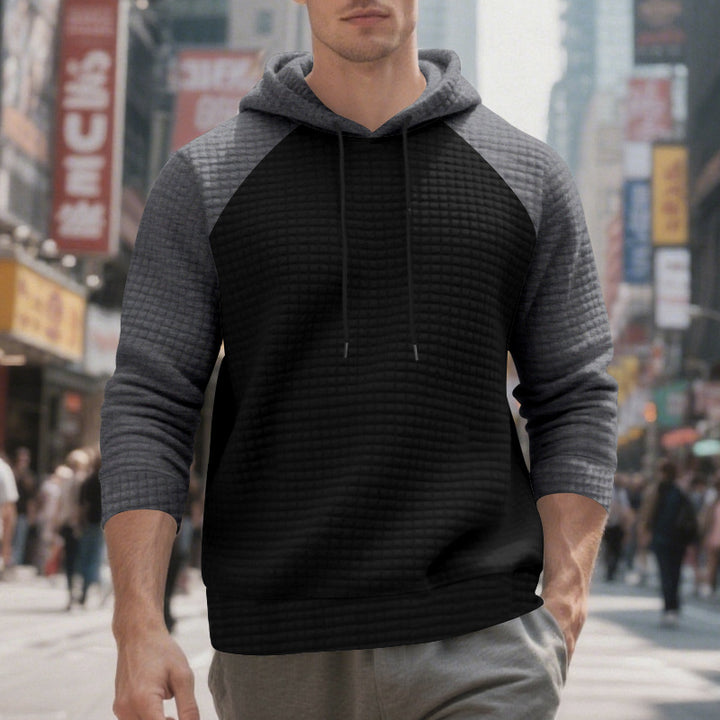 Men's quilted hoodie with raglan sleeves and drawstring StylebySassy