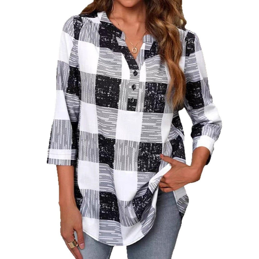 Women’s loose checkered tunic blouse with half button closure and rounded hem StylebySassy