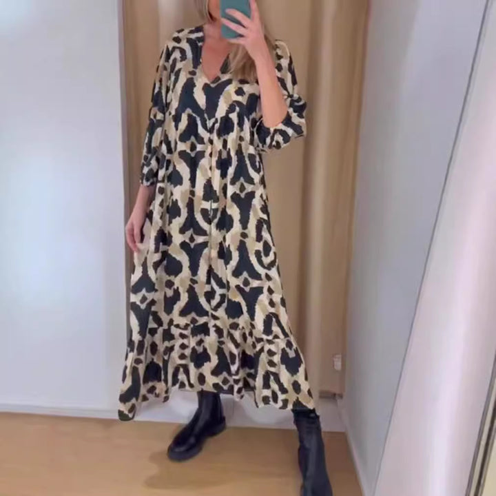 Women's flowing tiered maxi dress with V-neck, gathered bust panel and three-quarter sleeves StylebySassy