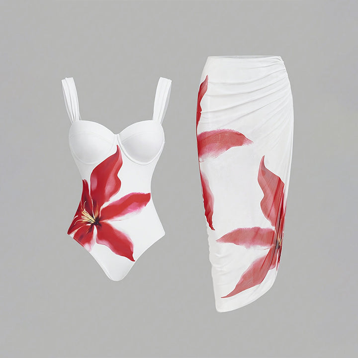 Women's one-piece swimsuit with elegant flower appliqué and draped skirt StylebySassy