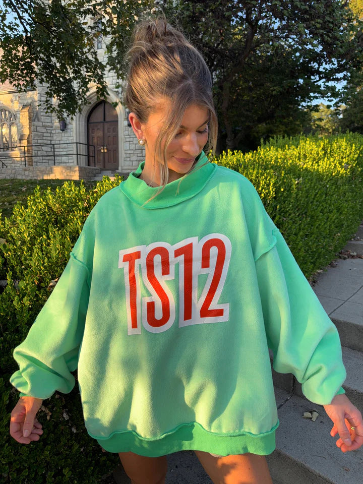 Women's oversized sweatshirt with high collar and eye-catching front print StylebySassy