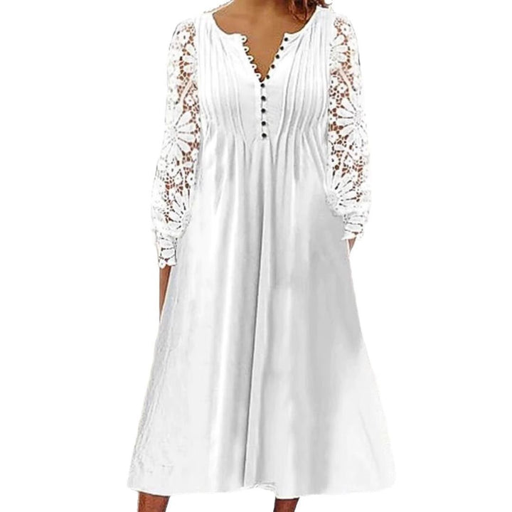 Ladies' knee-length A-line summer dress with crocheted long sleeves, pleated bodice and decorative button placket StylebySassy